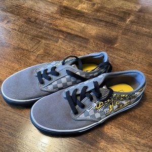 Boys Vans size 4, gray with yellow dinosaur skeleton down the side.